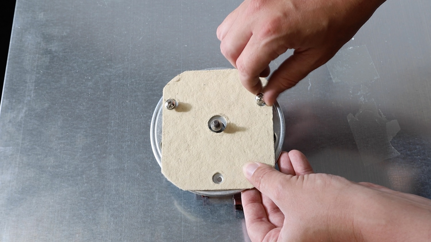 Attach the insulation plate and screws